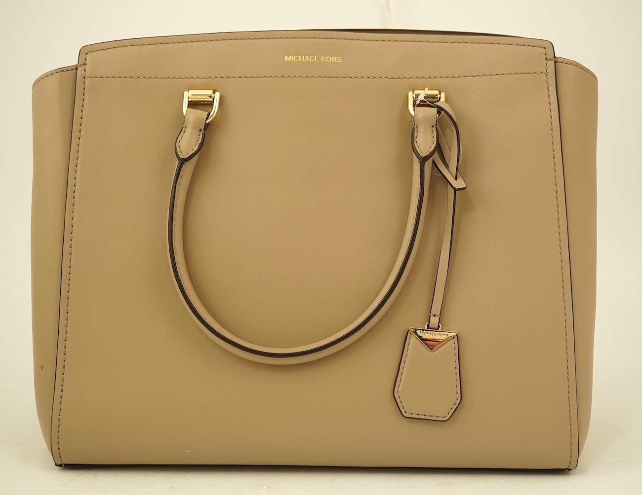 A Michael Kors taupe leather handbag